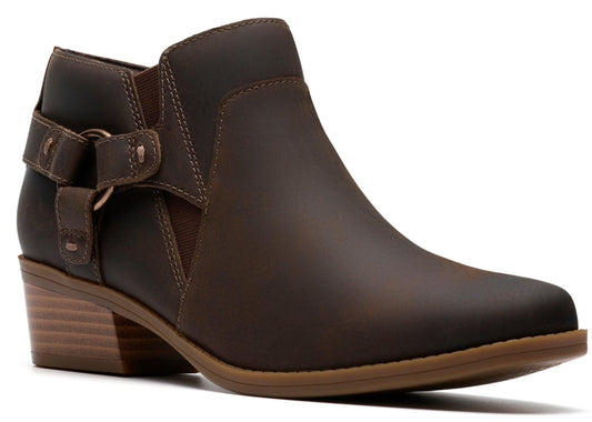 Dark brown ankle boot with buckle and low stacked heel.