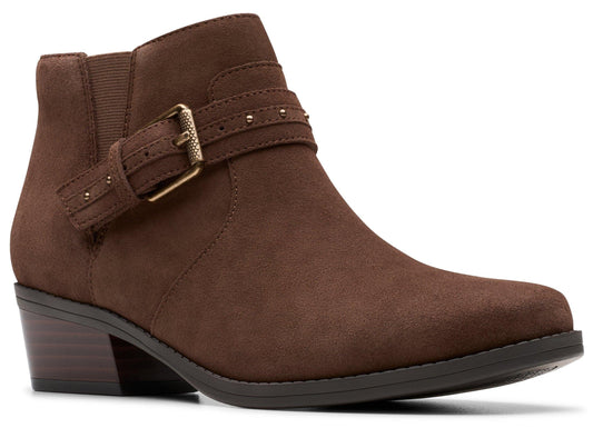 Brown ankle boot with a buckle strap and low heel.
