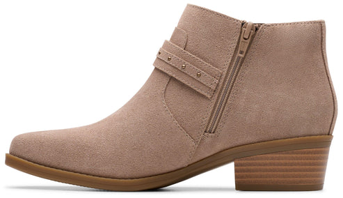 Side view of taupe ankle boot with side zipper and decorative strap with rivets