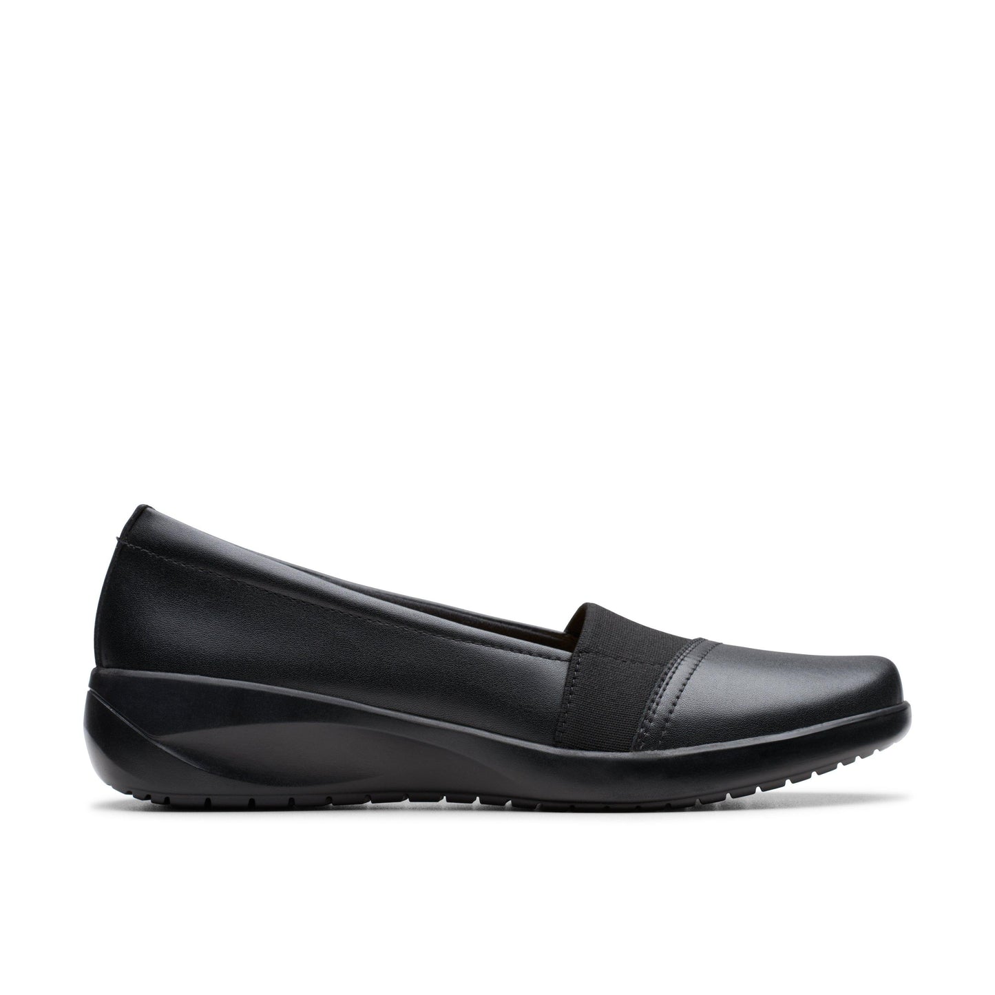 Black slip-on dress shoe with a low wedge heel and elastic strap.