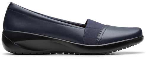 A navy-blue slip-on shoe with a flat, black sole.