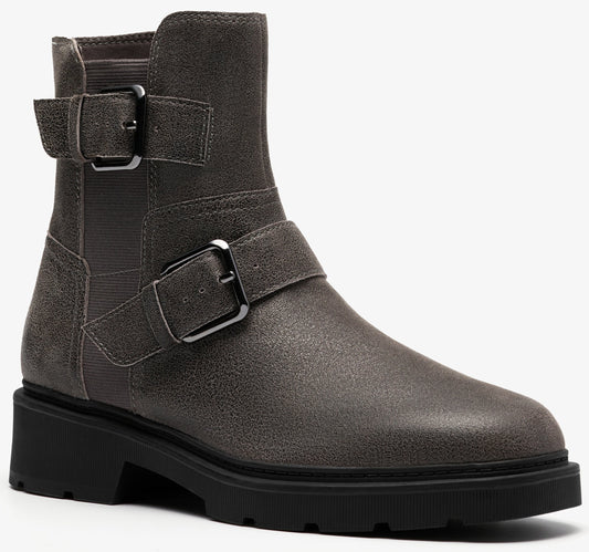 Gray ankle boot with two decorative buckle straps and a thick black lug sole.