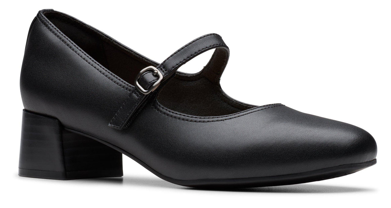 Black Mary Jane heel with an ankle strap and buckle.