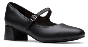 Black Mary Jane heel with an ankle strap and buckle.