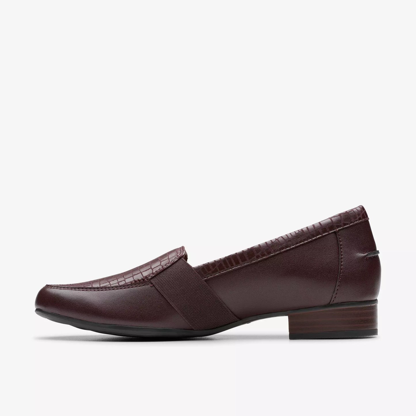 Dark brown leather loafer with a block heel and crocodile-textured accents.