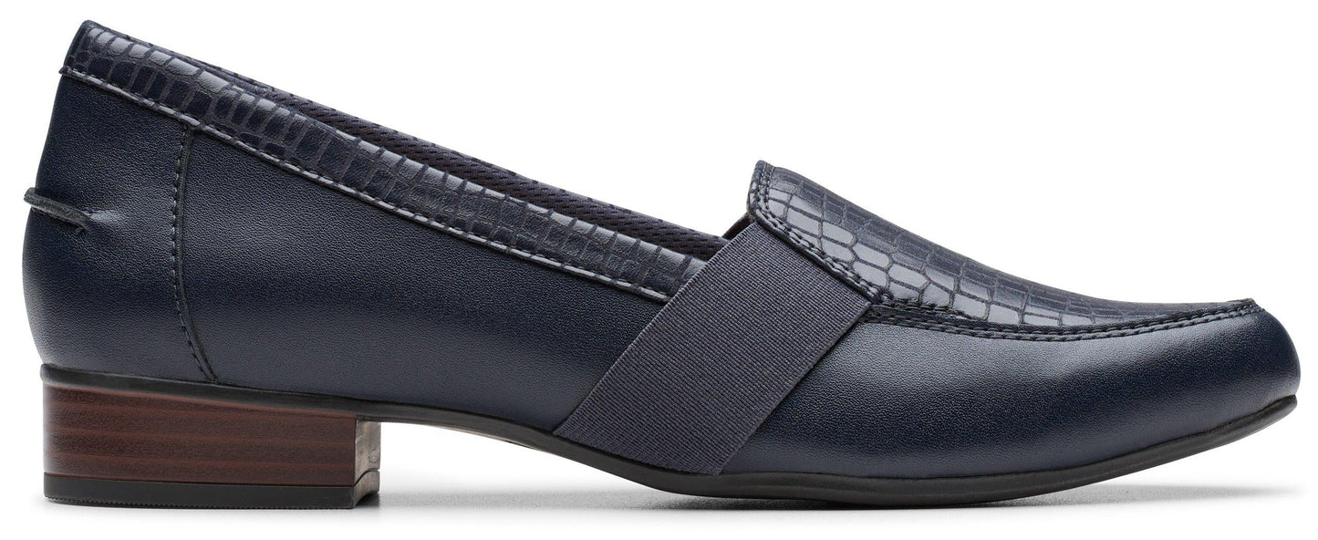 A navy blue, block heel loafer.