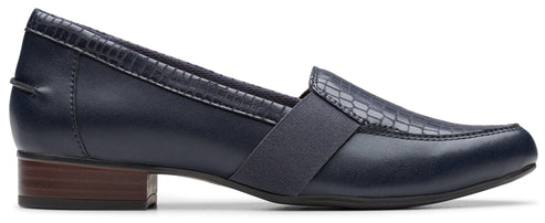 A navy blue, block heel loafer.