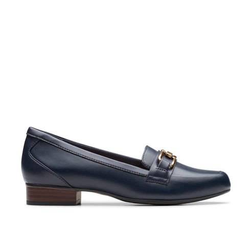 Side view of a shiny navy blue leather heeled loafer with gold-colored hardware.