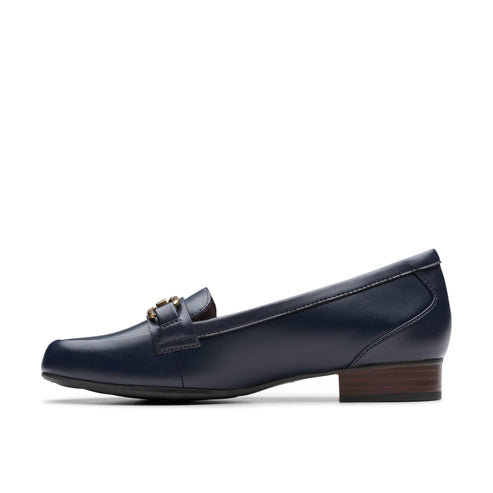 A navy leather loafer with a square toe and a gold buckle.