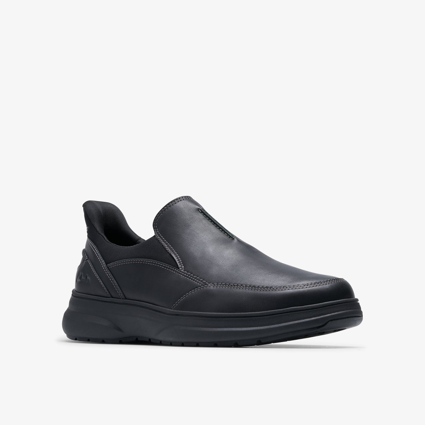 Black leather slip-on shoe with a rounded toe and thick black sole.