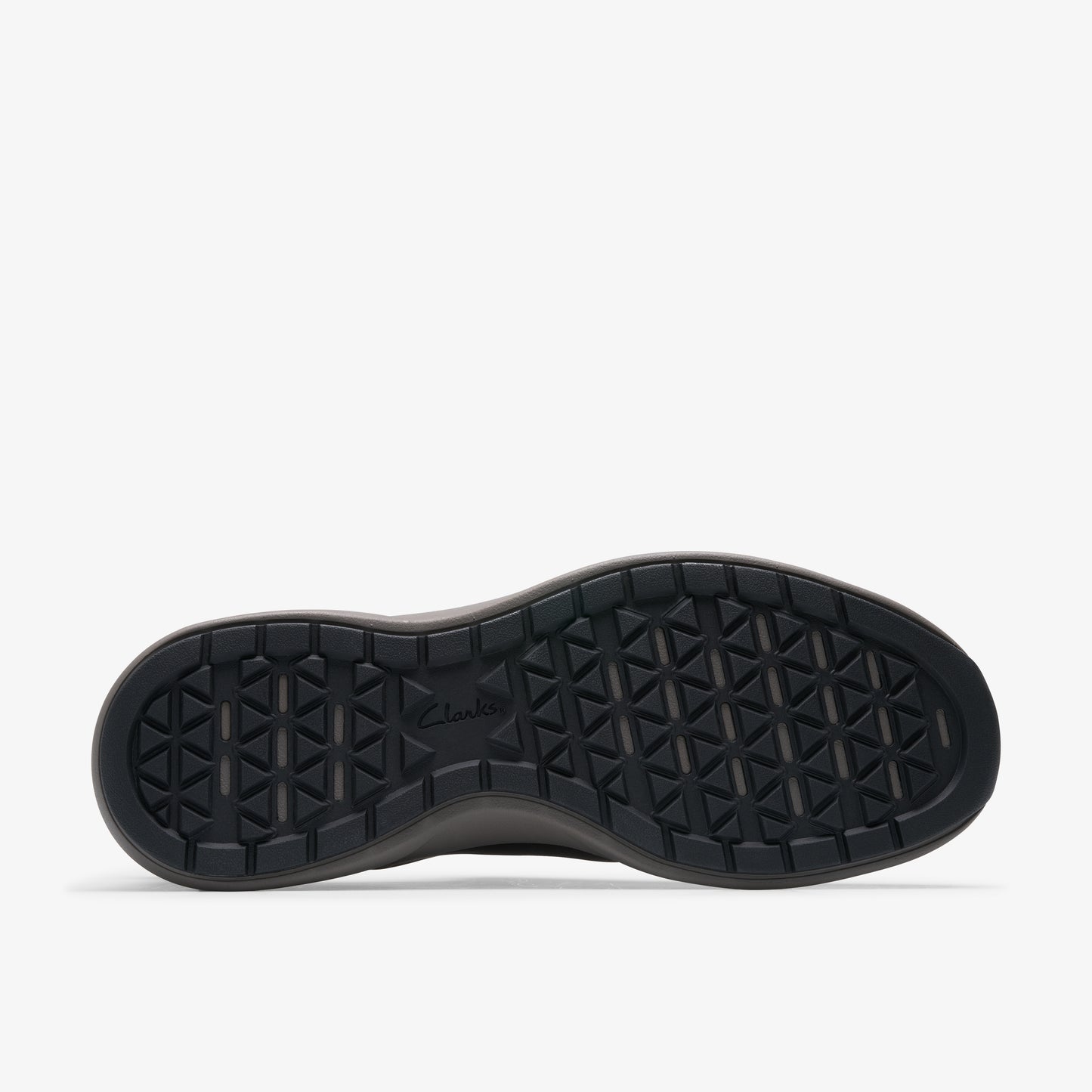 shoe sole with repeating triangular tread pattern