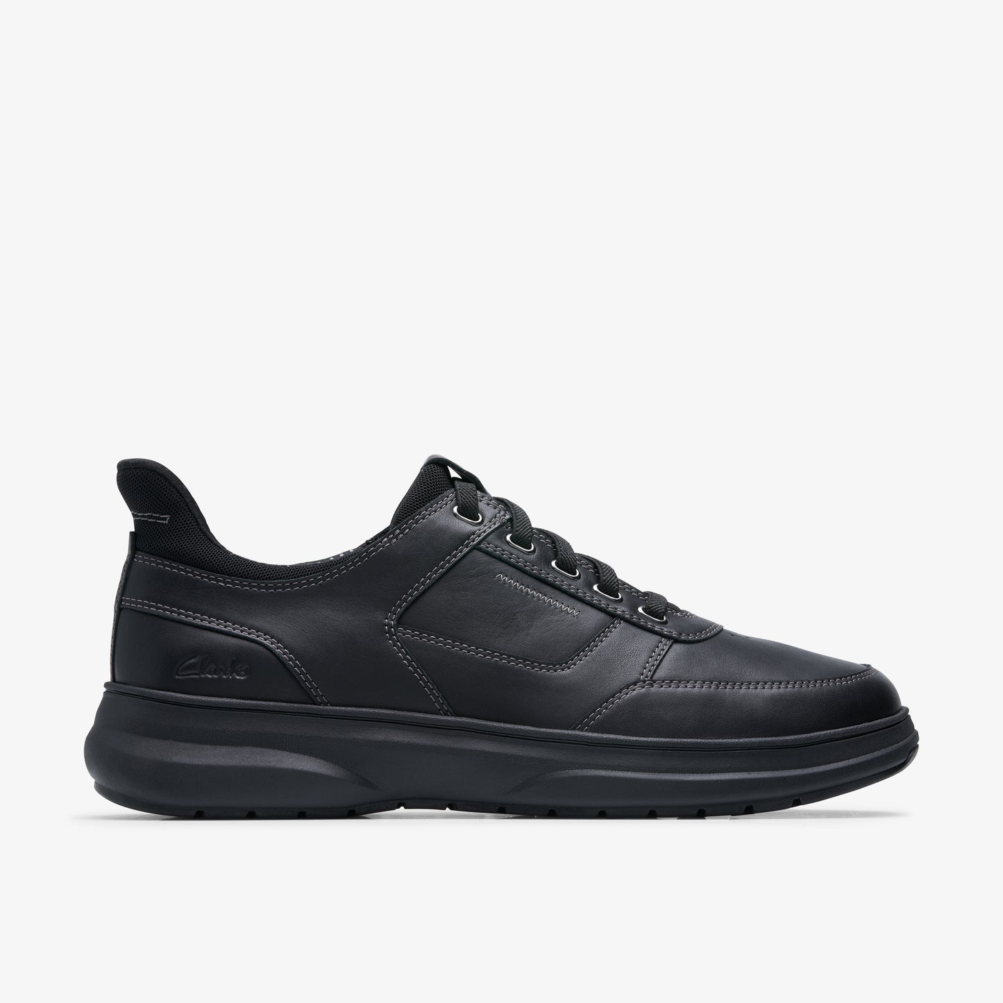 Black leather athletic shoe with cushioned sole, lace-up closure, and padded collar.