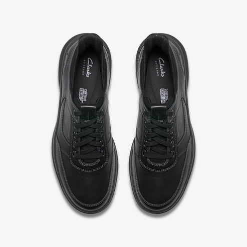 A pair of black leather shoes with black laces, "Clarks" text visible on the shoe.