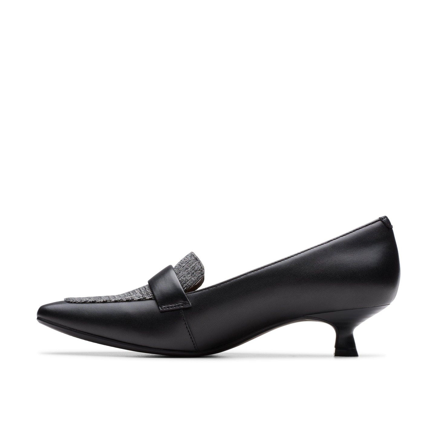 Black leather loafer pump with a pointed toe and a kitten heel.