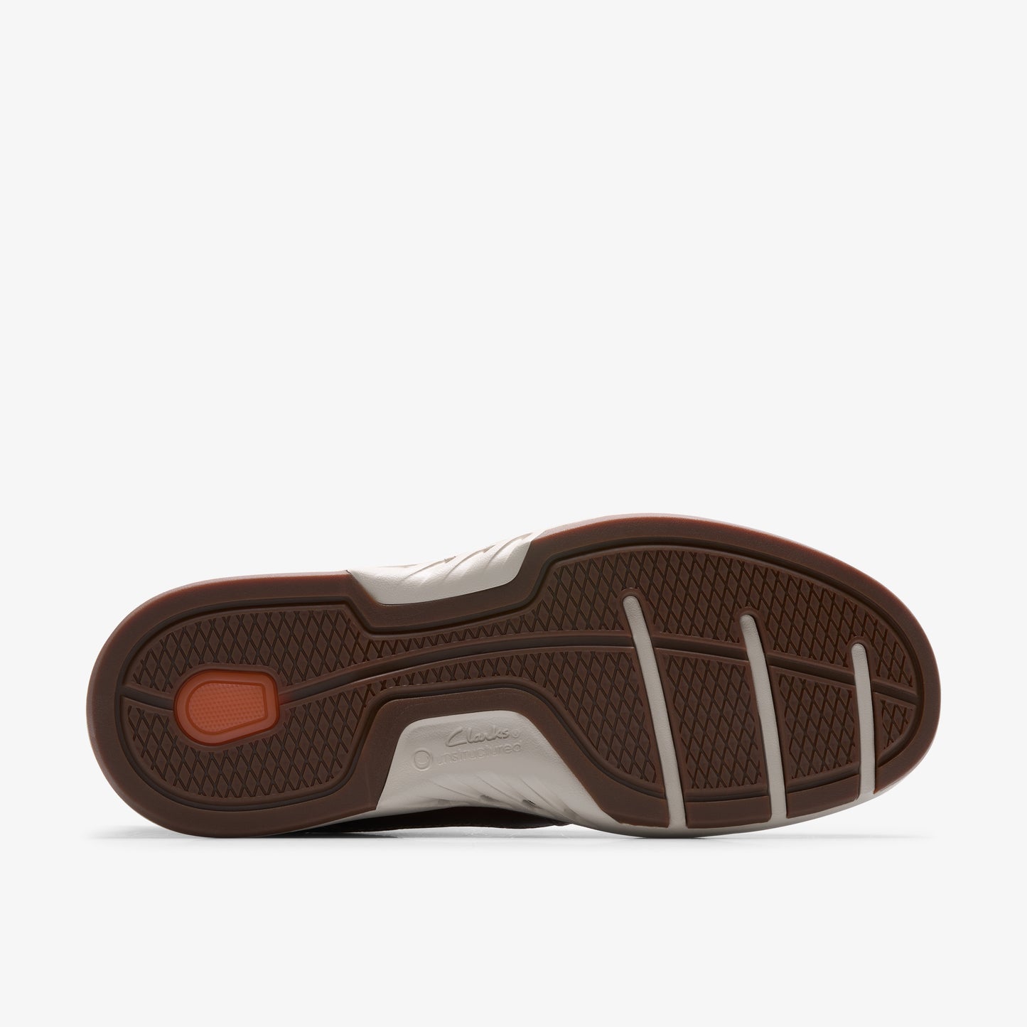 Angled view of a shoe's brown sole with a textured pattern.