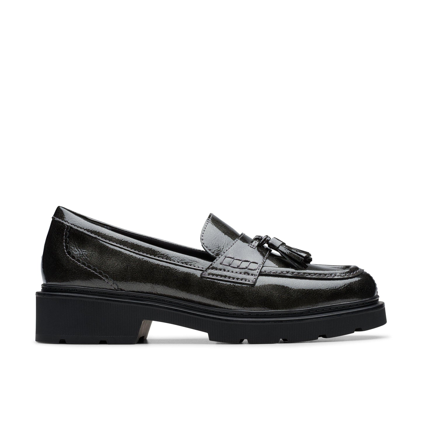 Black leather tassel loafer with chunky sole.