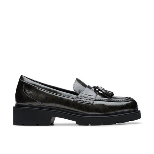 Black leather tassel loafer with chunky sole.