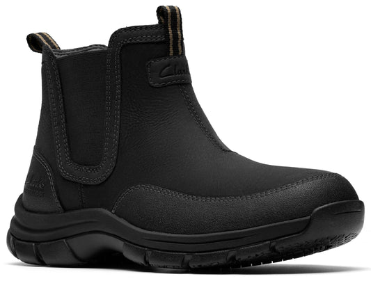 Black Chelsea boot with elastic side panels, pull tab and lug sole.