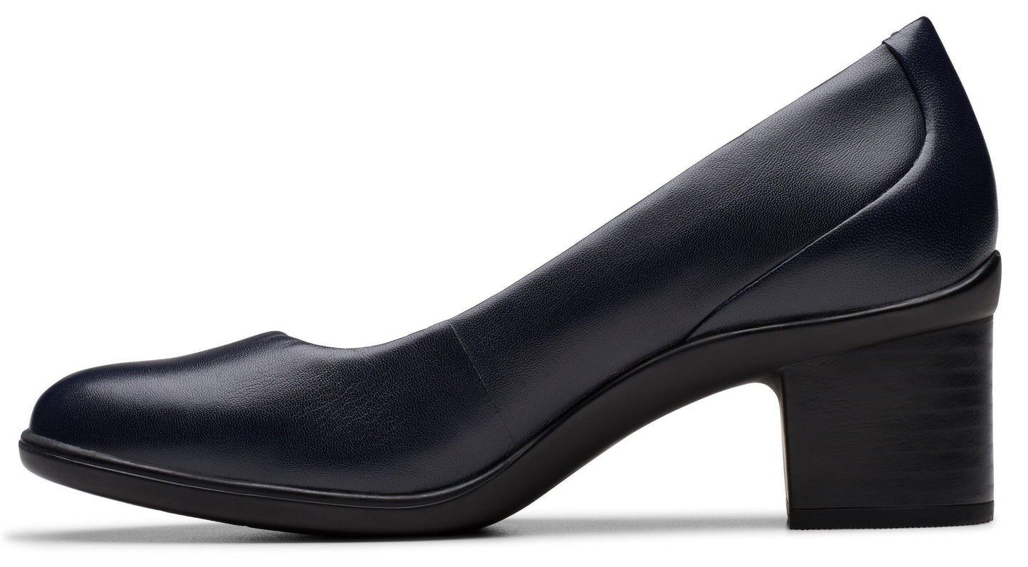 Navy leather heeled pump with block heel.