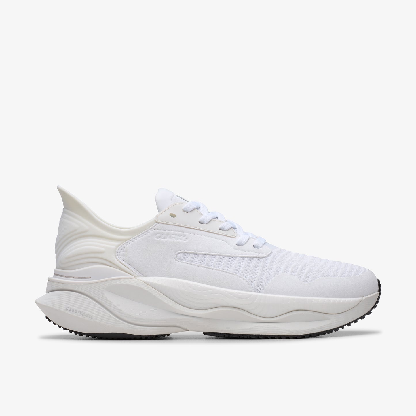 White athletic shoe with a raised heel and a black sole.