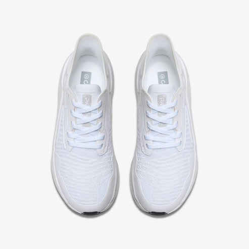 Pair of white running shoes with laces.