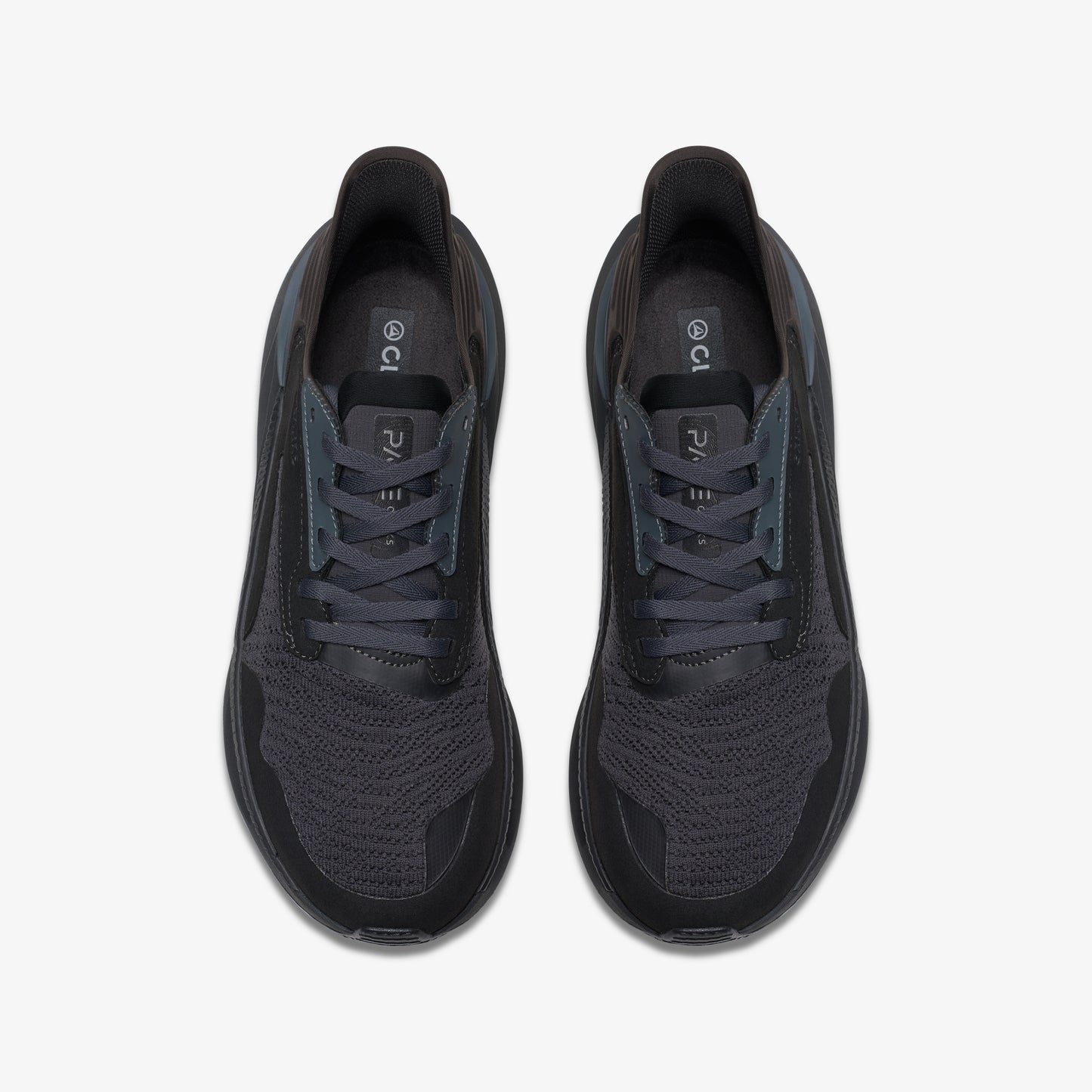 Overhead view of pair of black running shoes with laces.