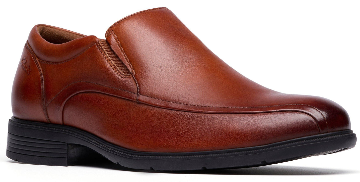 Brown leather slip-on dress shoe with a black sole.