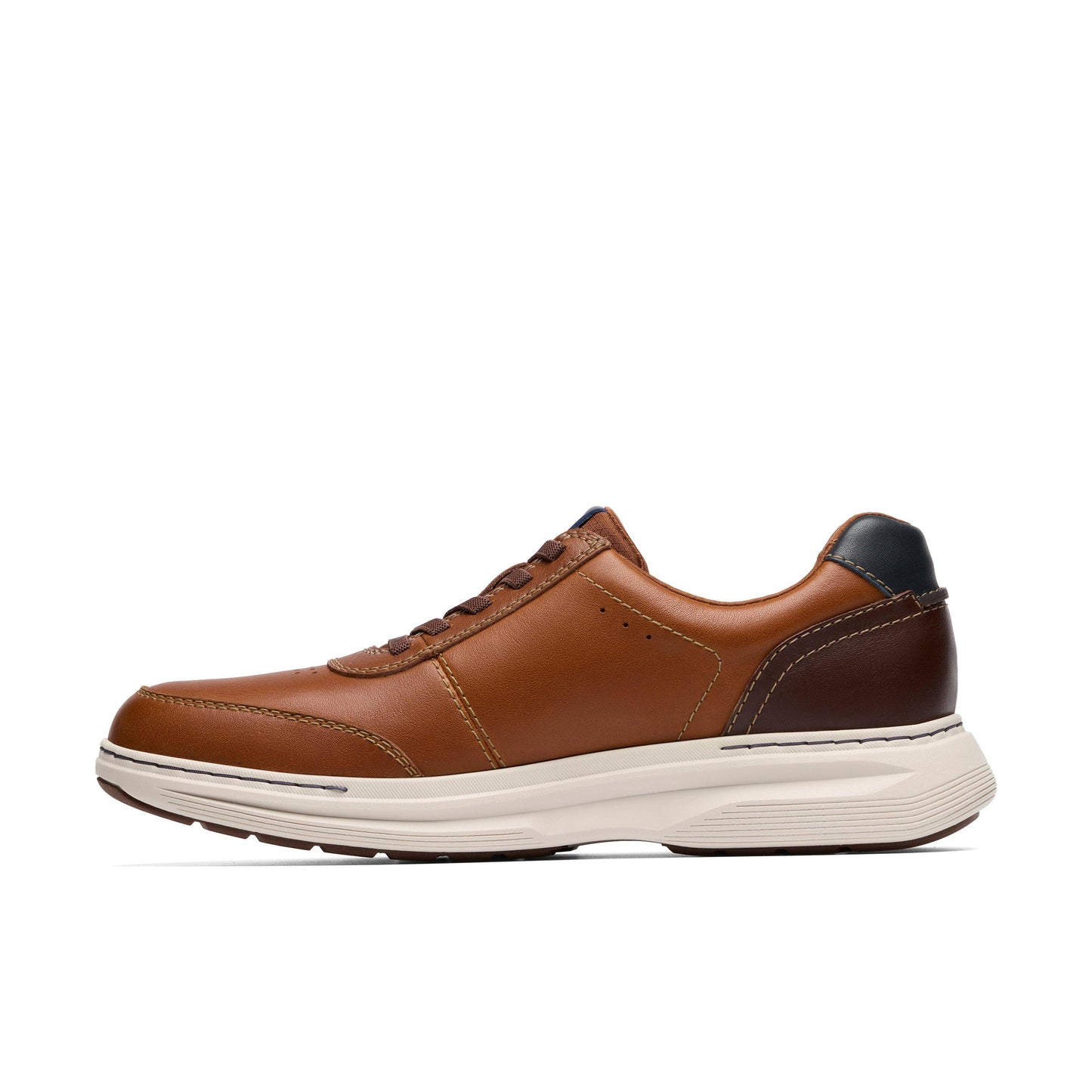 Men's leather shoe with tan leather upper and a thick white sole.