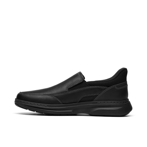Black leather slip-on shoe with a low, chunky sole.