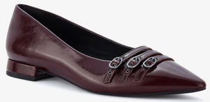 Maroon leather pointed-toe flat with three straps across the toe box with silver buckles.
