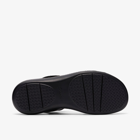 Black sandal sole with textured tread.