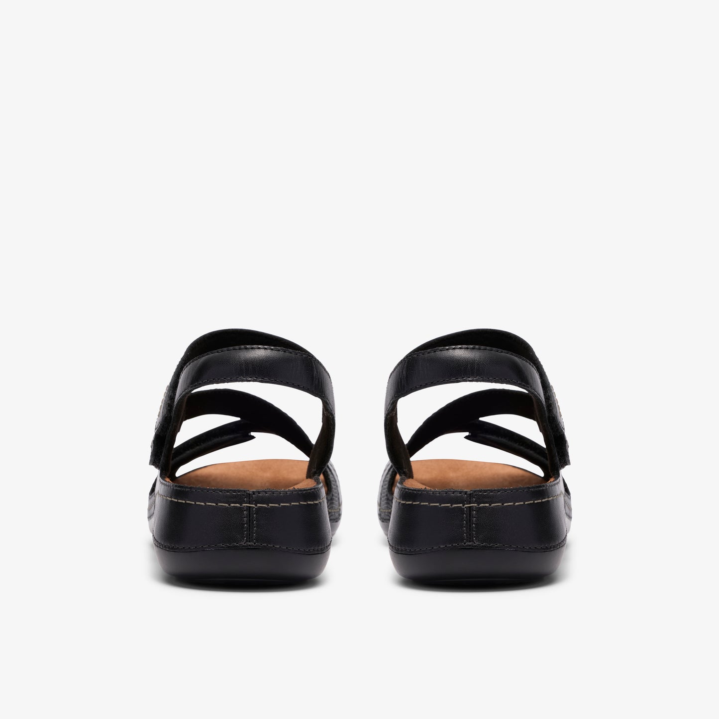 Pair of black sandals with adjustable straps.