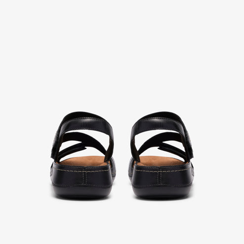 Pair of black sandals with adjustable straps.