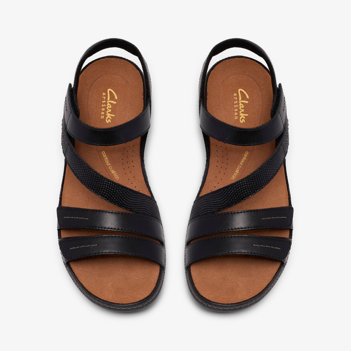 Overhead shot of two black leather sandals with straps; one strap crosses diagonally. Insole reads "Clarks ARTISAN" and "ultimate comfort".