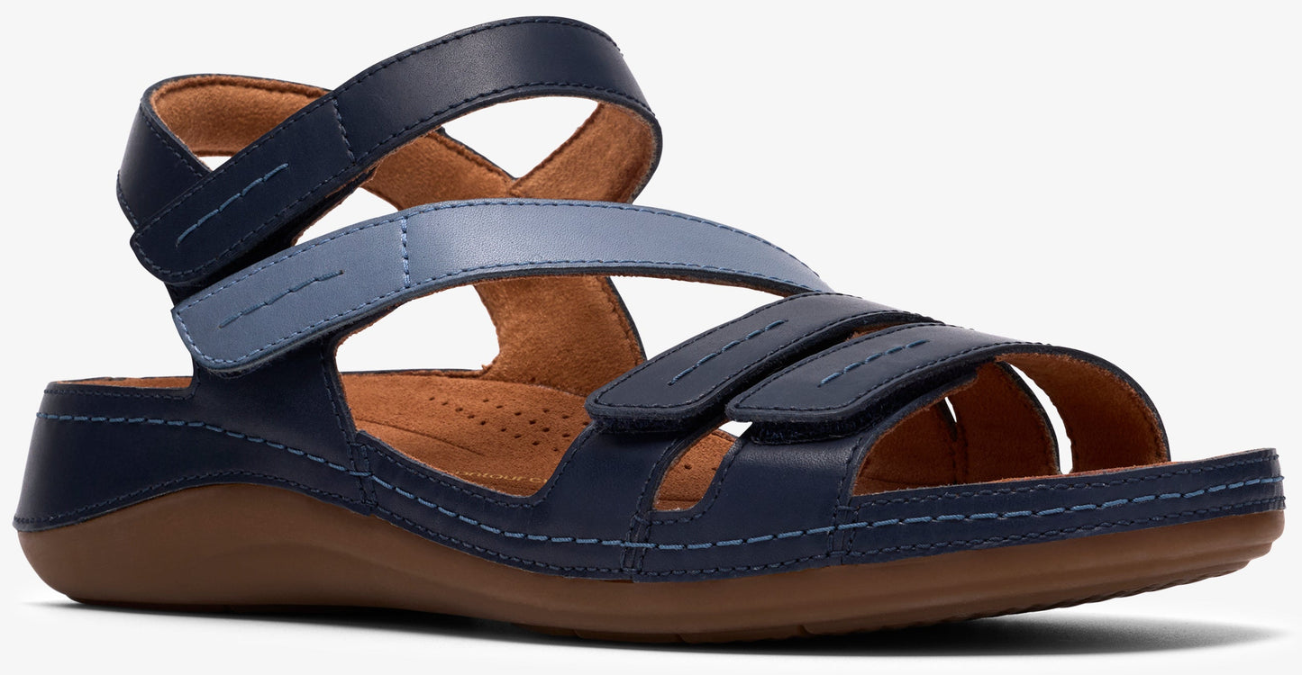 Blue sandal with several straps and a brown sole.