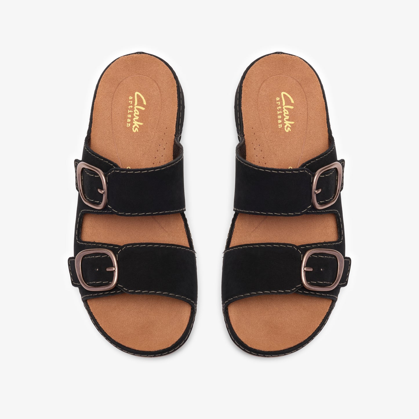 A pair of black, two-strap slide sandals with gold buckles, seen from directly above.