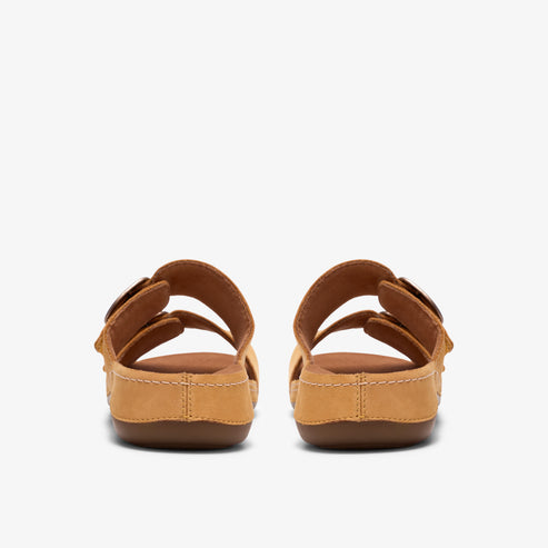A pair of tan sandals with two adjustable buckle straps.