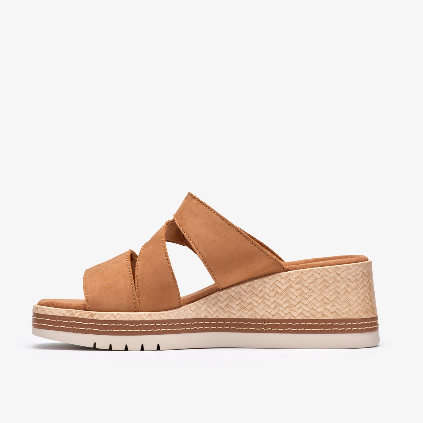 Tan crisscross wedge sandal with a white sole.