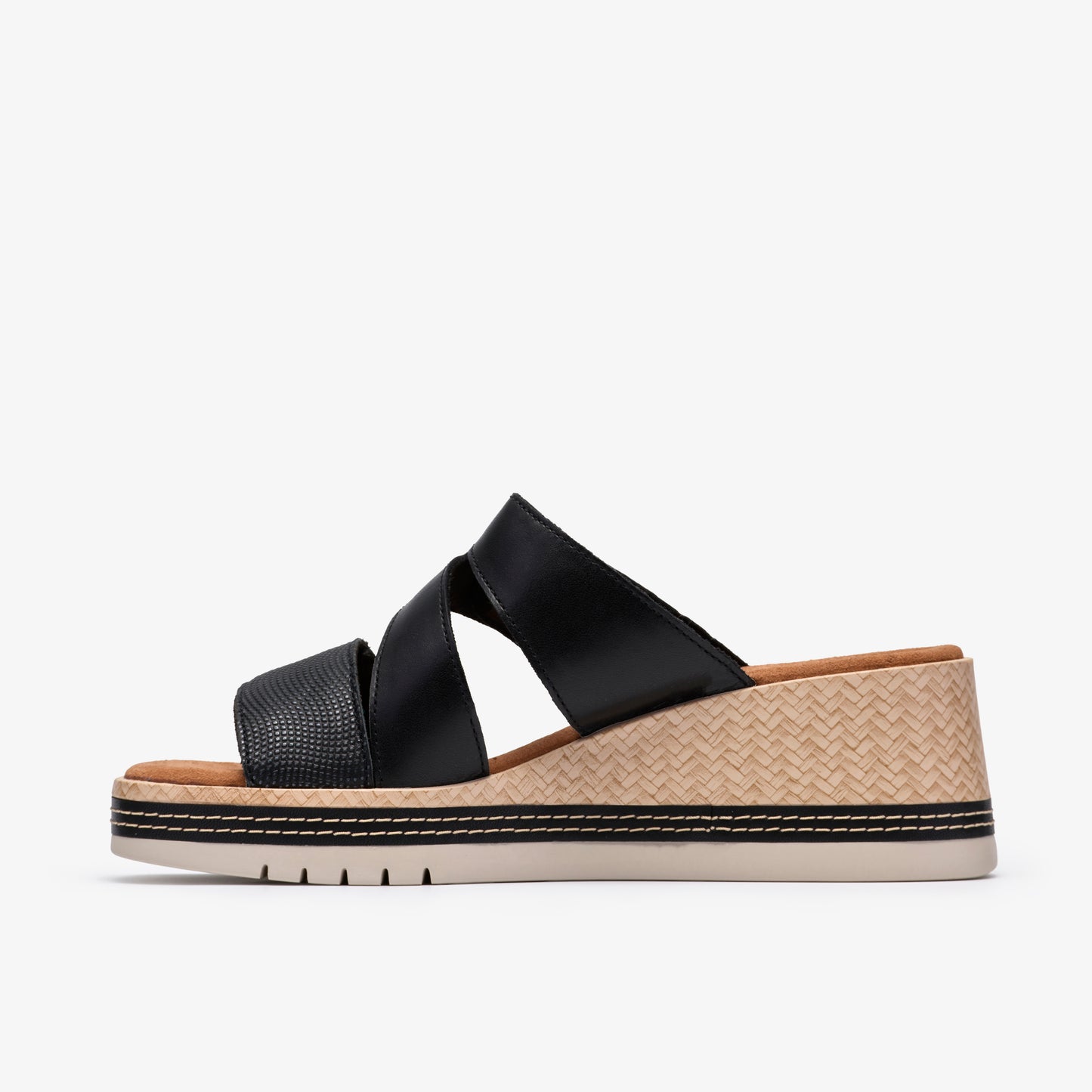 A black platform sandal featuring a woven platform.