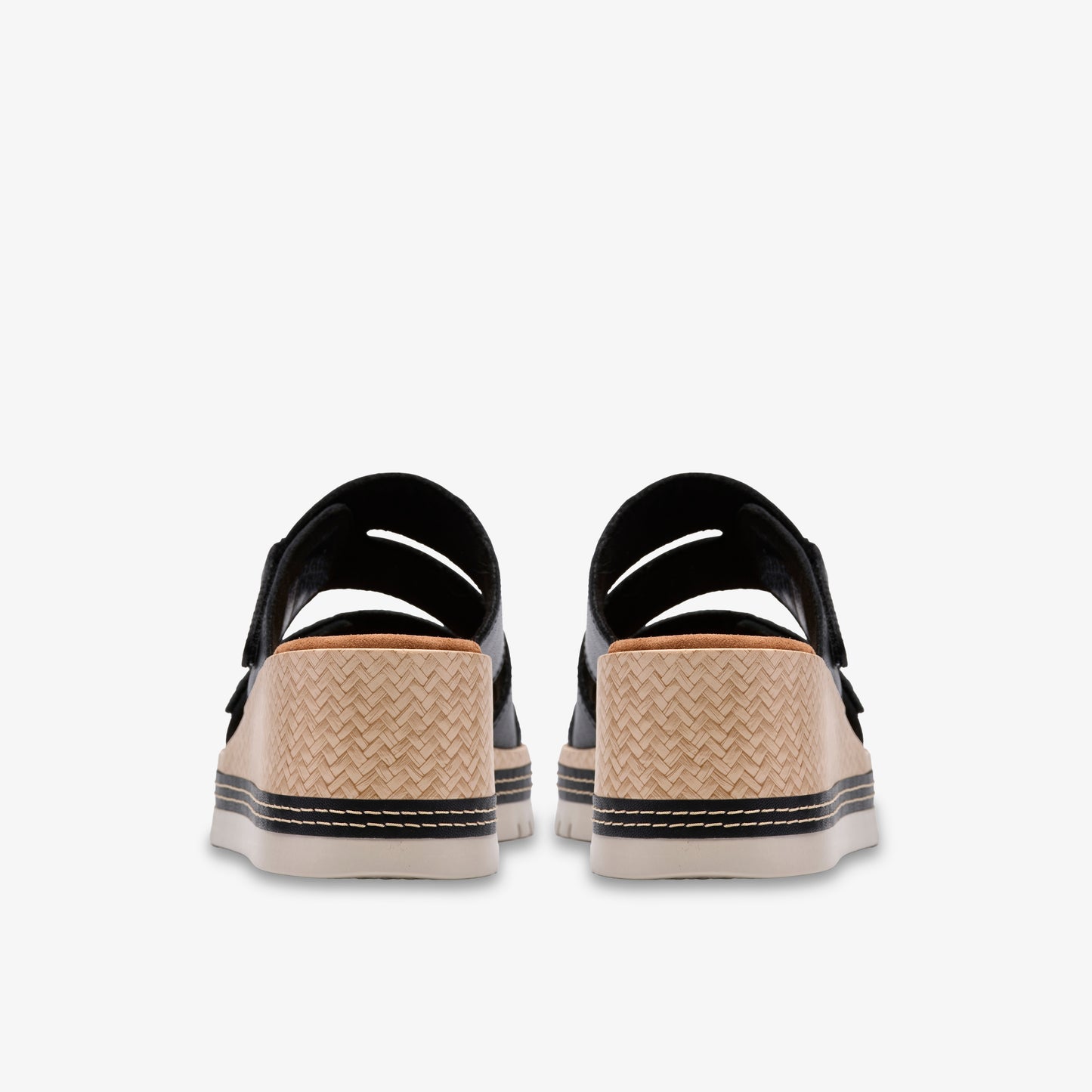 Pair of open-backed women's platform sandals with woven heel