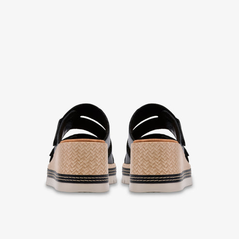 Pair of open-backed women's platform sandals with woven heel