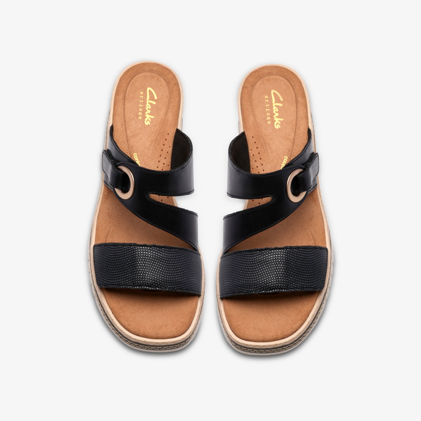 Pair of black sandals with gold hardware and two straps.