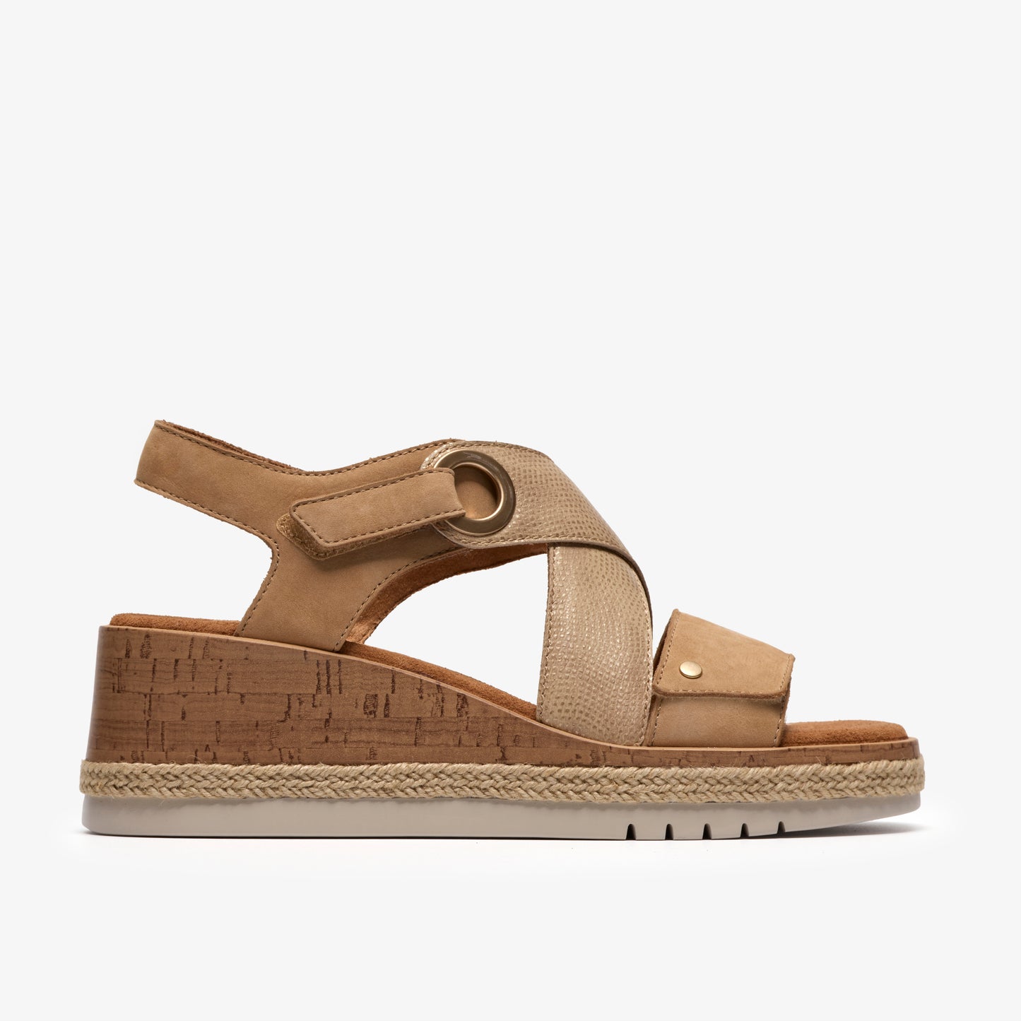 Tan wedge sandal with cork platform and velcro straps.