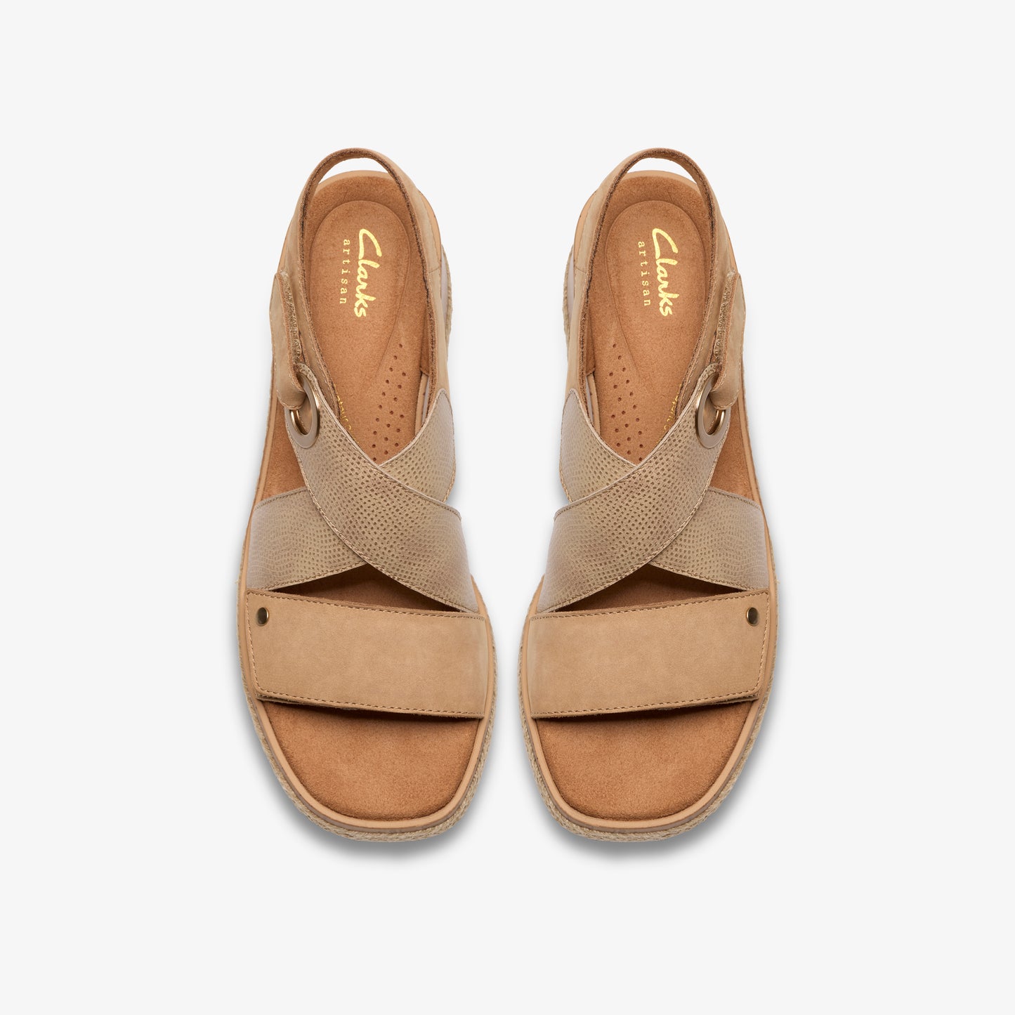 Top view of Clarks Artisan branded tan crisscross sandal with ankle strap.