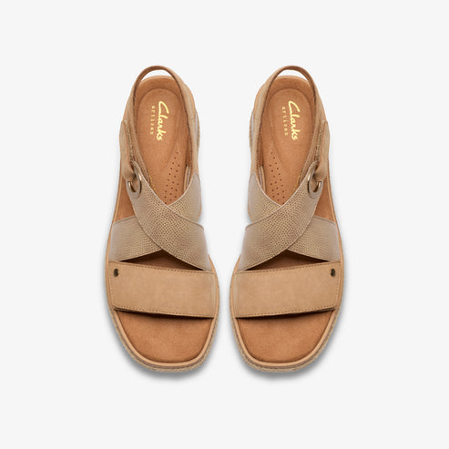 Top view of Clarks Artisan branded tan crisscross sandal with ankle strap.