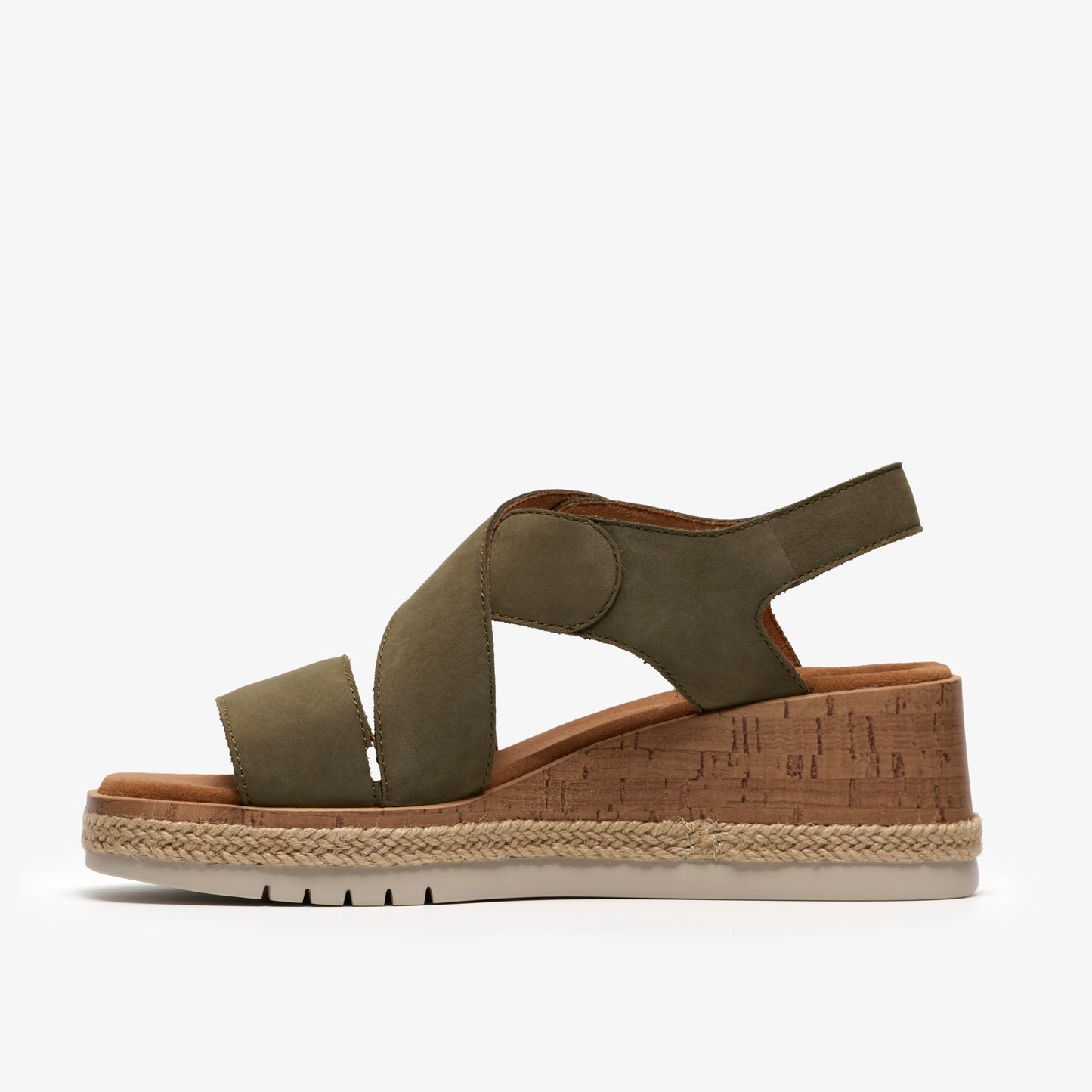 Olive green sandal with cross straps and a cork wedge heel.