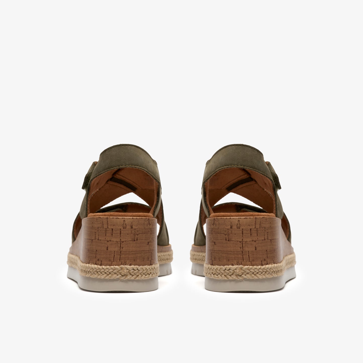 Pair of olive green, open-toed sandals with faux cork platform wedge heels.