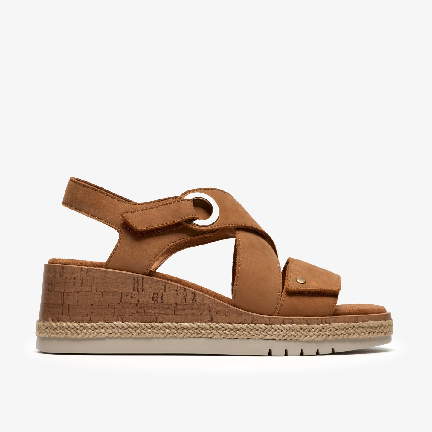 Tan wedge sandal with adjustable straps and cork platform.