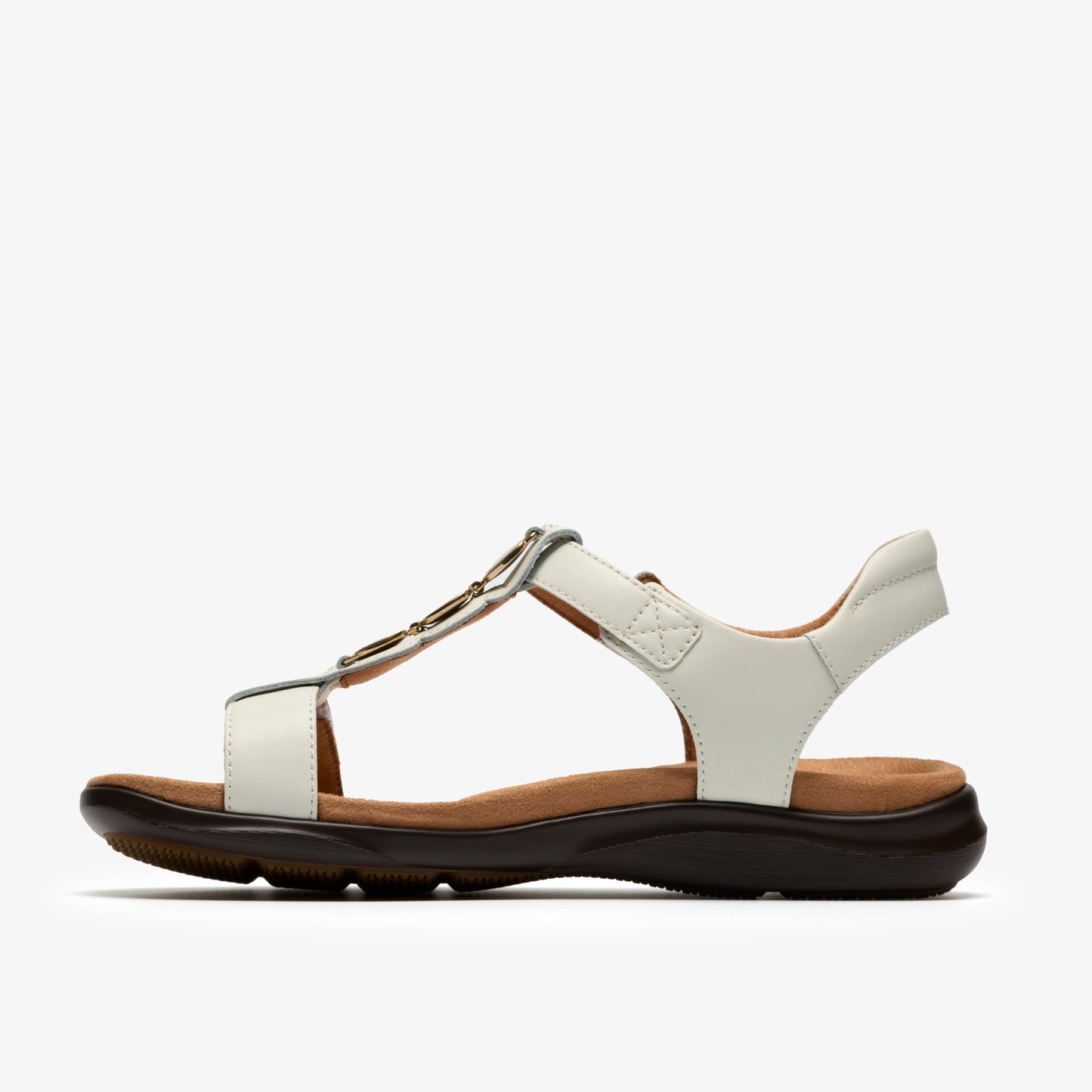 White sandal with decorative metallic t-strap and hook-and-loop ankle strap.