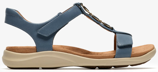 Blue sandal with decorative beads and a low, tan sole.
